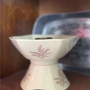 Vintage buckwheat candle stick holder.
